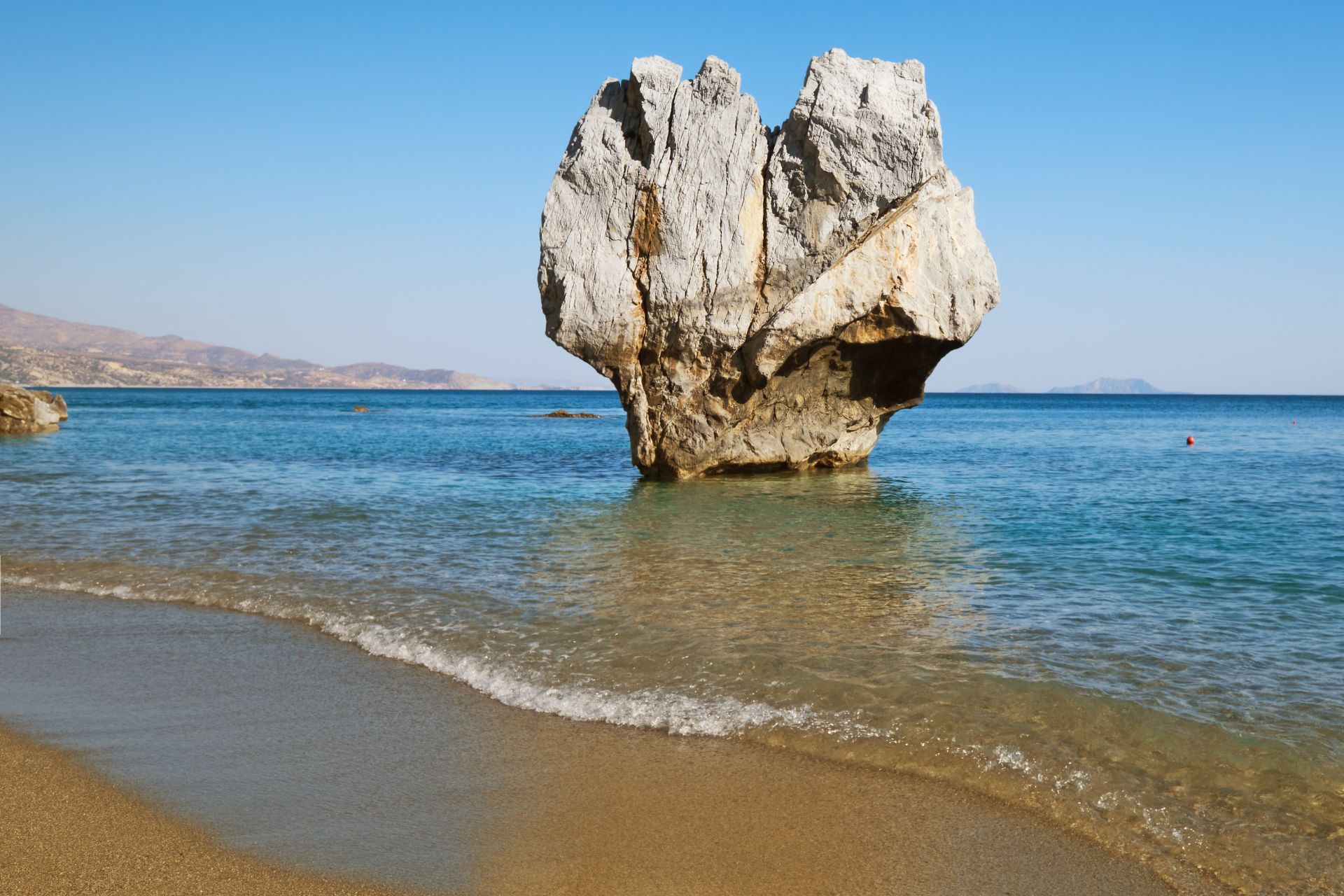 heart shaped rock in preveli beach